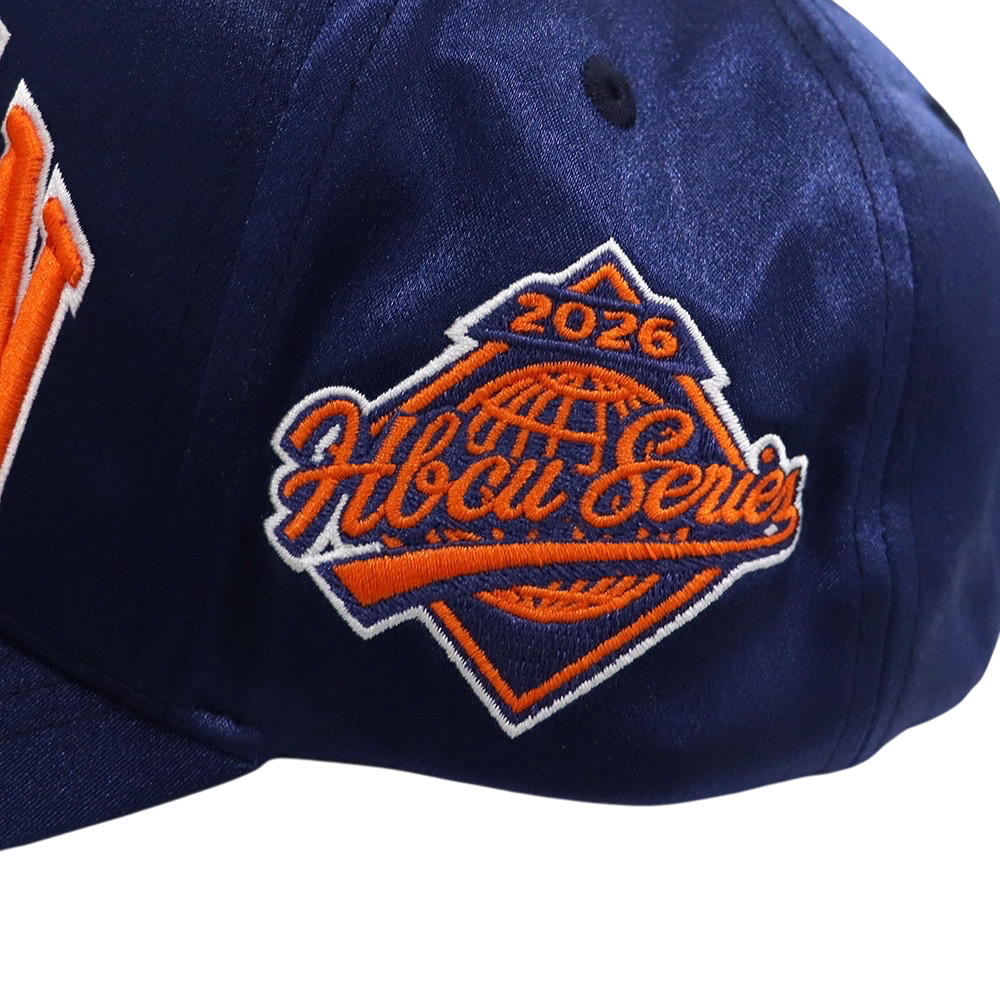 EXTERNAL HERITAGE Morgan satin snapback cap in navy blue with orange and white 2026 HBCU Series side embroidery